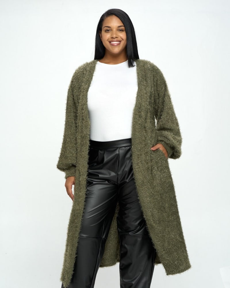 Front of a model wearing a size 1X Feather Bishop Sleeve Pocket Cardigan in Olive by L I V D. | dia_product_style_image_id:240193
